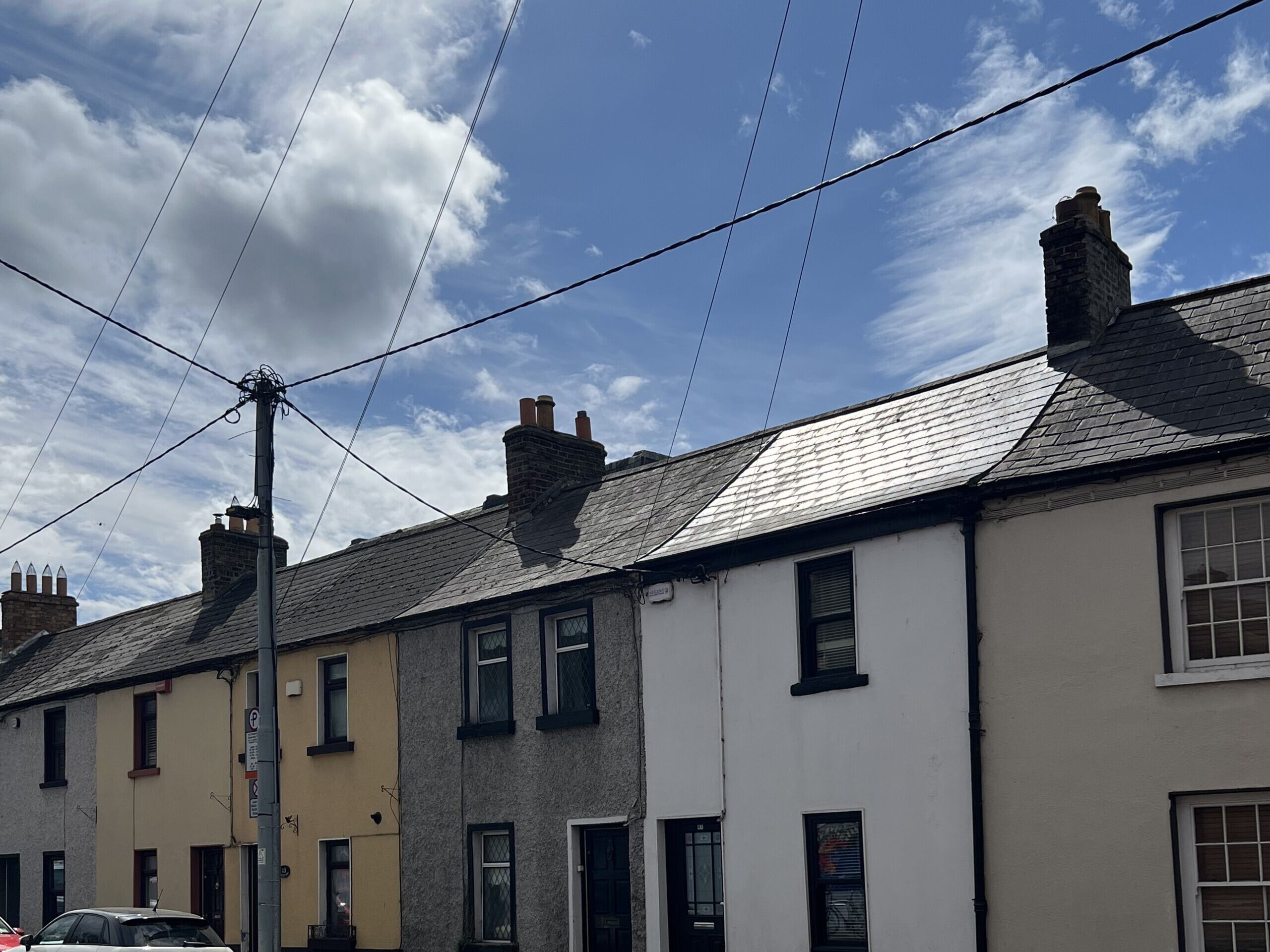 roof and gutter cleaning done on one of many houses in Ireland